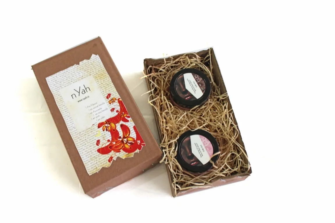 Nyah Medium Old Times Handmade Box Body Butters – 2 × 50 g, Open tan gift box with two round containers and vintage-style illustrated lid.