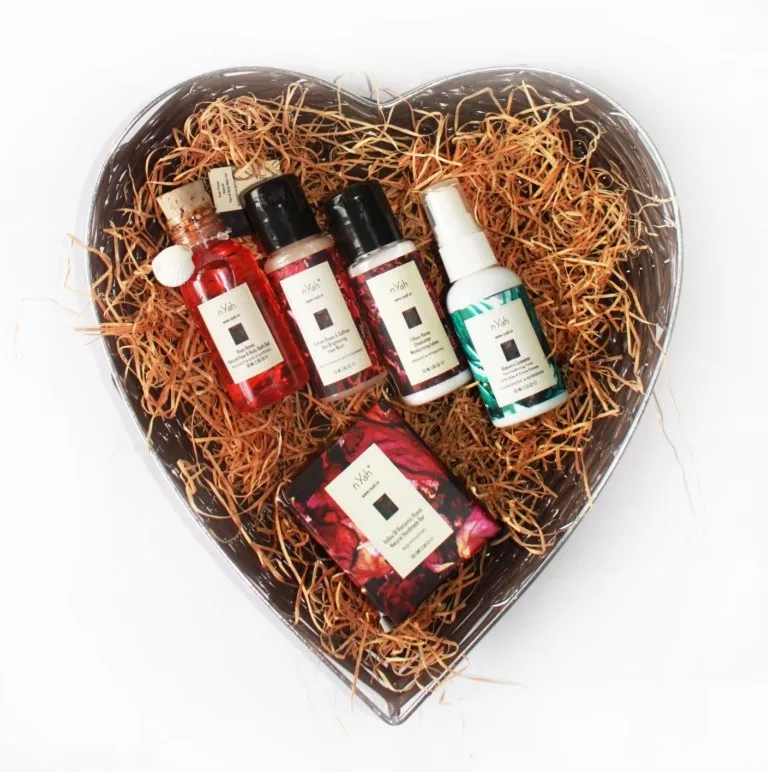 Nyah Luv Basket Gift Rose Set – Small (70 ml), Heart-shaped basket with several small bottles/containers and filler.