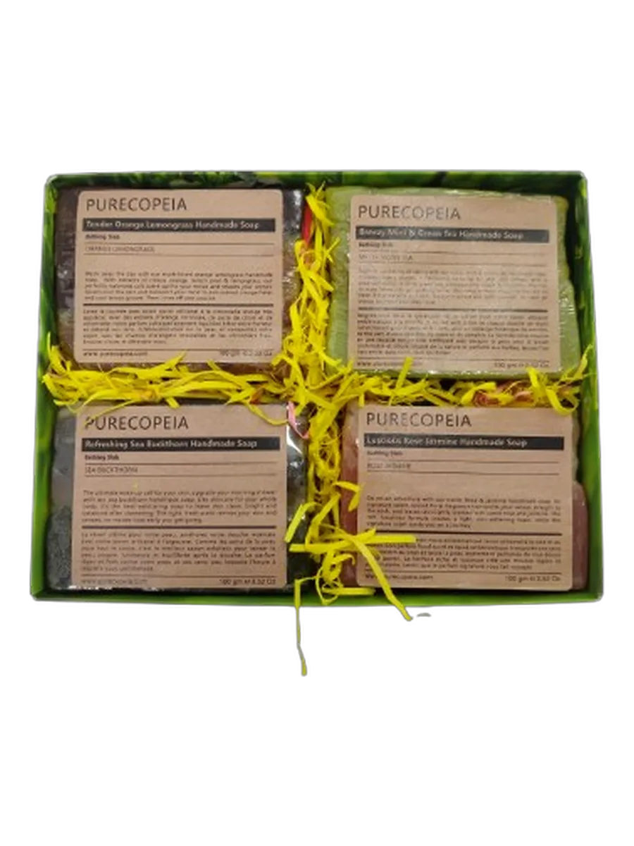 Four-piece boxed soap gift set, on a transparent studio-style background